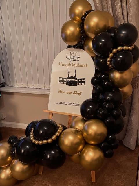 Black and gold Umrah Mubarak display